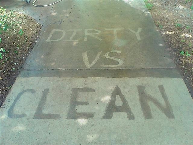 Dirty vs clean message pressure washed into concrete